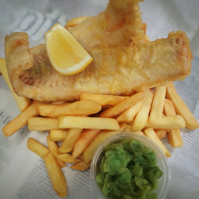 Battered Haddock, chips and mushy peas